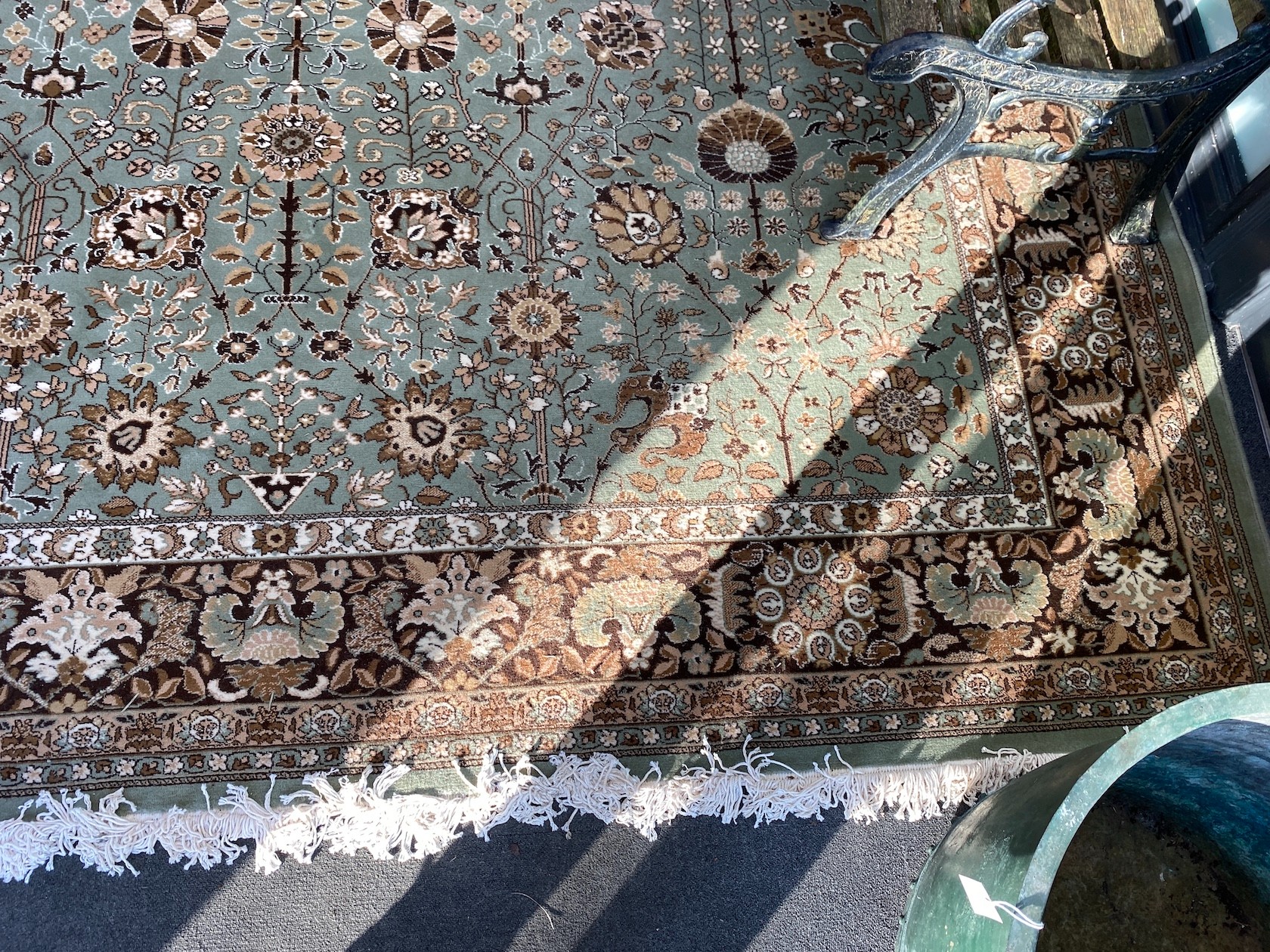 A Tabriz style green ground carpet, 400 x 300cm